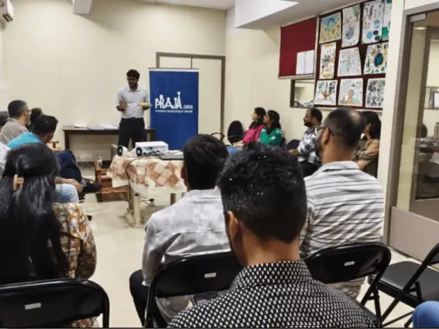 Guests in conversation at U-CAN City Mixer, Praja Foundation, Mumbai, December 19, 2025